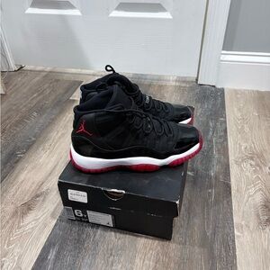 Air Jordan “Bred” 11 (2012) Size 6y (7.5) Women’s